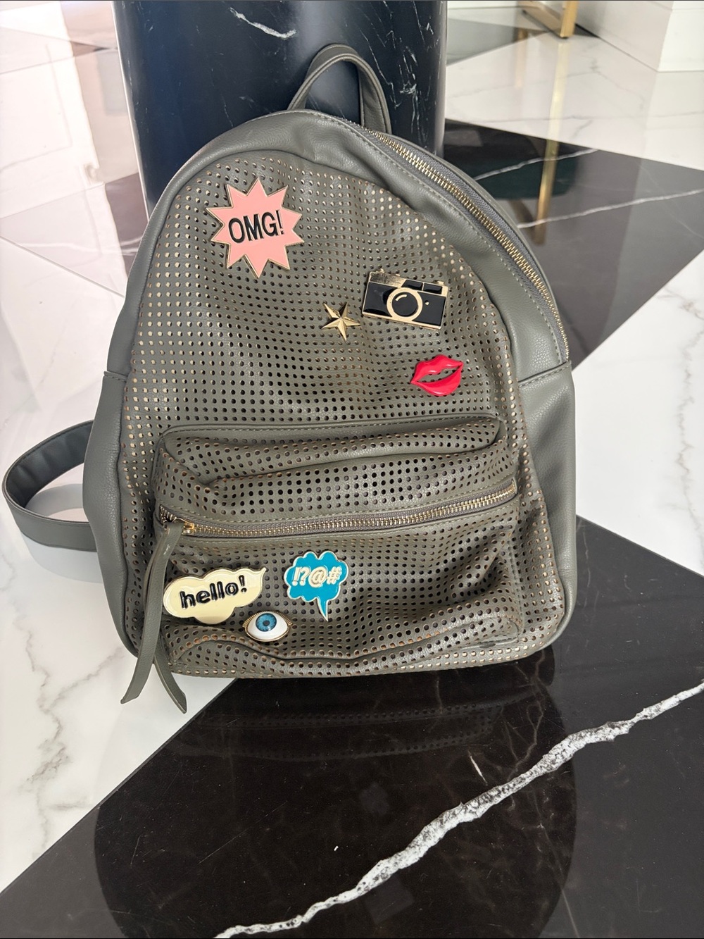 Perforated Gray Faux Leather Backpack with Fun Pin Accents